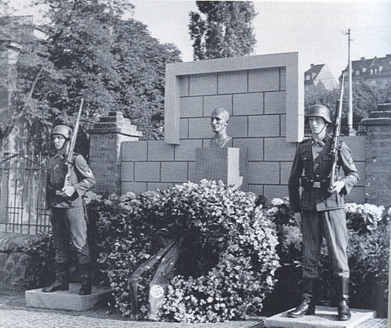 The Heydrich monument with its perpetual SS guard